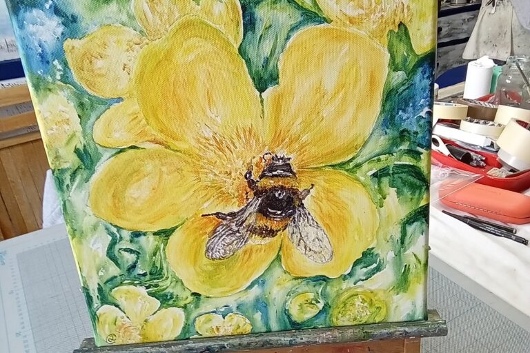 a painting of a great yellow bumblebee on yellow flower on an easel.